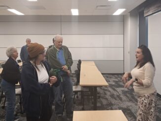 Sdoia speaks with audience members at Urban Campus after her presentation on Thursday, April 9.
