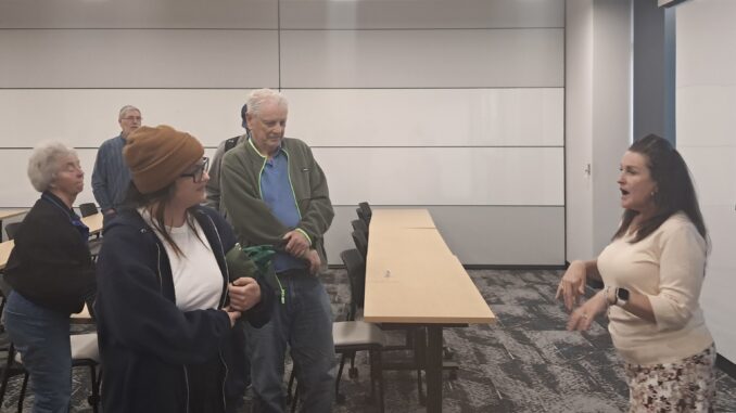 Sdoia speaks with audience members at Urban Campus after her presentation on Thursday, April 9.